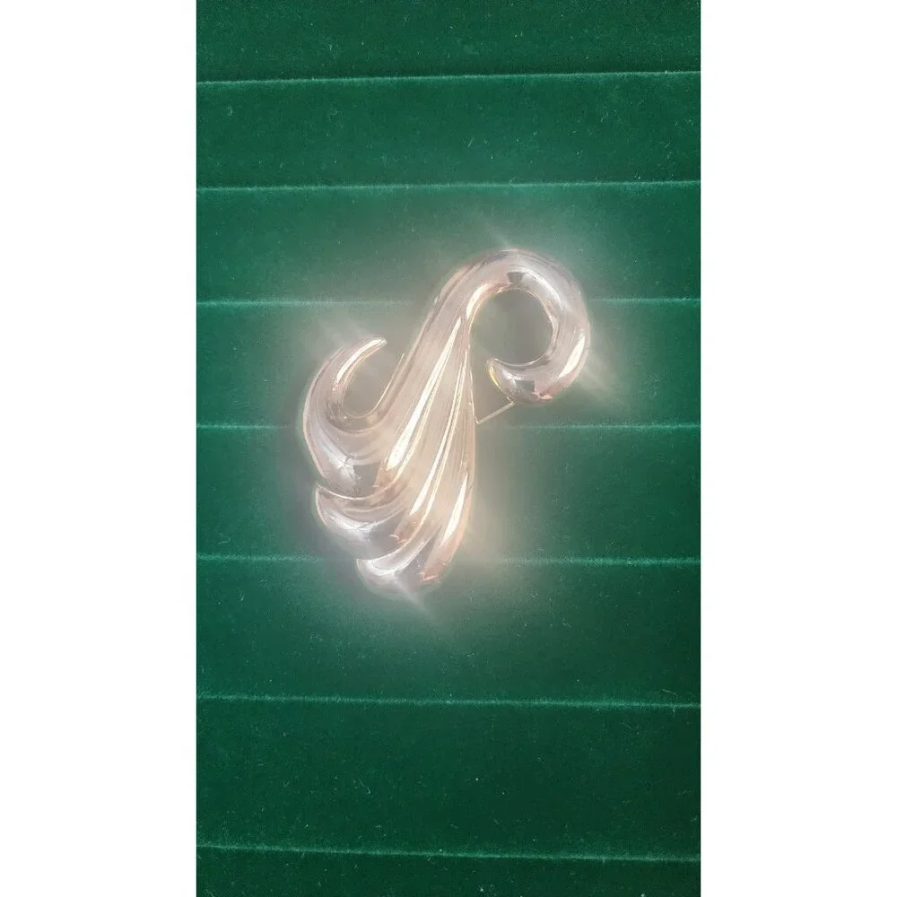 Vintage 80s gold tone sculptural swirl brooch large abstract high polish